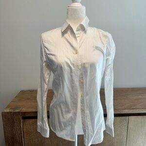 4 white shirts,sz 4/6. All 4 20$. One has been worn lightly,other ones not worn